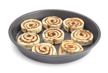 Baking Pan Full of Unbaked Cinnamon Roll Dough Ready to be Cooked