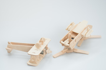 Wooden model plane in accident concept.