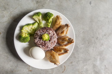 clean food , Fried chicken ,Broccoli  vegetable , egg and rice
