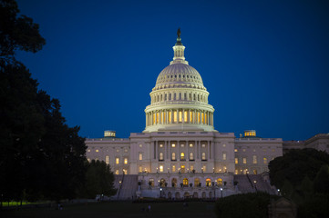 US Capitol Building dome illuminated at dusk