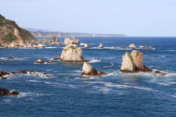 Rocky coast with rock island in Asturias, Spain