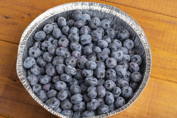 Freshly picked blueberries in a bowl. 