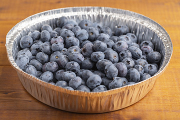 Freshly picked blueberries in a bowl. 