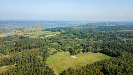 Obraz premium drone image. aerial view of rural area with fields and forests. textured background