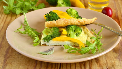 Fototapeta na wymiar Omelet with broccoli and yellow pepper frittata