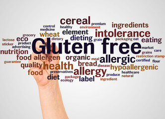 Gluten free word cloud and hand with marker concept