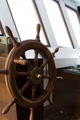 Wooden rudder and navigational equipment inside the captain's cabin © 682A_IA
