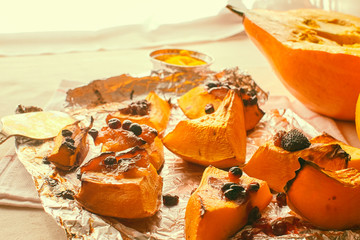 Homemade baked sweet pumpkin with cranberries closeup