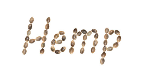 The word Hemp written with hemp seeds and isolated on white background