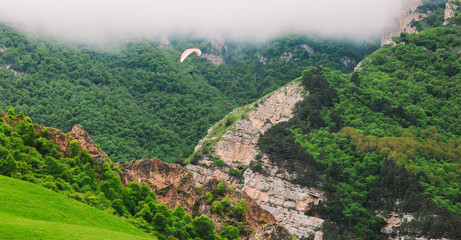 Beautiful landscape with paragliders.