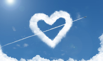 heart shaped cloud and airplane in the sky 3