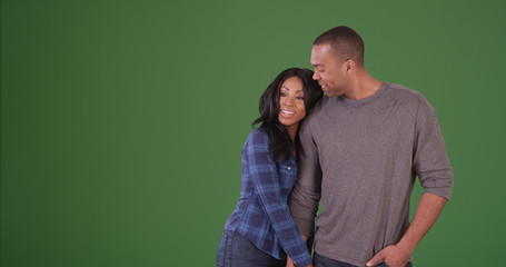 Happy African American couple spending time together on green screen