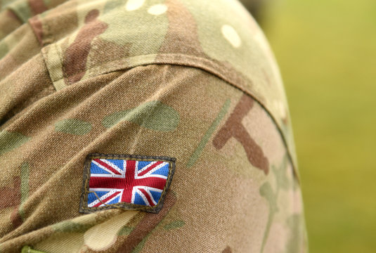 UK Patch Flag On Soldiers Arm. UK Military Uniform. United Kingdom Troops