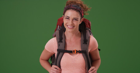 Young pretty woman out on hike on green screen