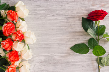 Roses on a wooden background