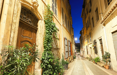 Fototapeta na wymiar The old street in the historic quarter Panier of Marseille in South France at night