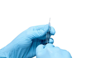 Hands of the beautician in blue gloves holding syringe. The cosmetologist prepares for a injection cosmetology procedure. Isolated on white background