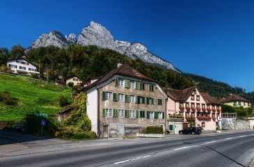 Fototapeta na wymiar Peak of the Gonzen seen from street level in Sargans, Swiss Rhine valley