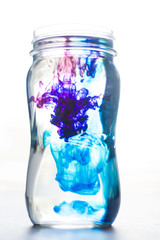 blue and red dye in water