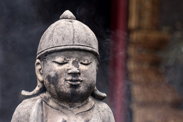 Fototapeta premium Vintage concrete statues in Wat Chai Mongkon - Buddhist Temple , Chiang Mai Thailand