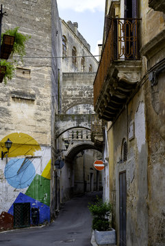 street view with flower pots in Apulia region. Grottaglie, Apulia
