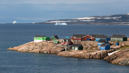 colorful houses in Ittoqqortoormiit, eastern Greenland at the entrance to the Scoresby Sound fjords © Agata Kadar