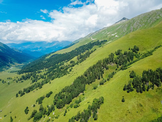 Aerial view from the drone. Summer mountain landscapes of Karachay Cherkessia, Dombay, Western Caucasus.