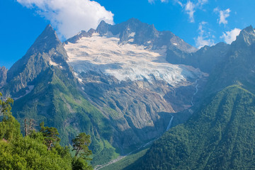 Fototapeta premium Aerial view from the drone. Summer mountain landscapes of Karachay Cherkessia, Dombay, Western Caucasus.