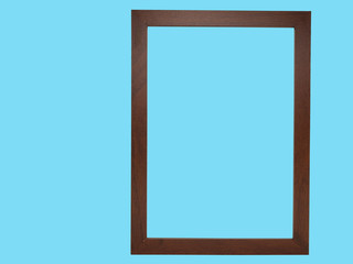 wooden frame isolated on blue background.