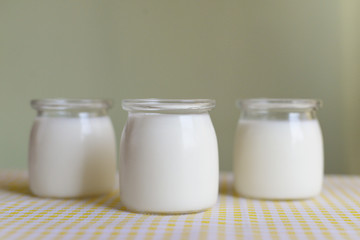 three jars of yogurt