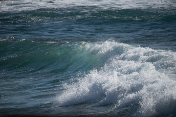 Foamy waves on sunny day