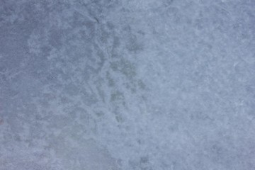Ice covered with snow.