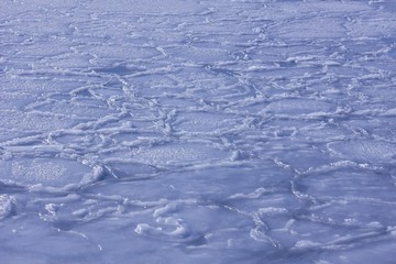 The blue uneven ice.