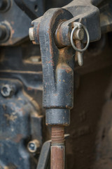 rusty bolt and pin on industrial equipment