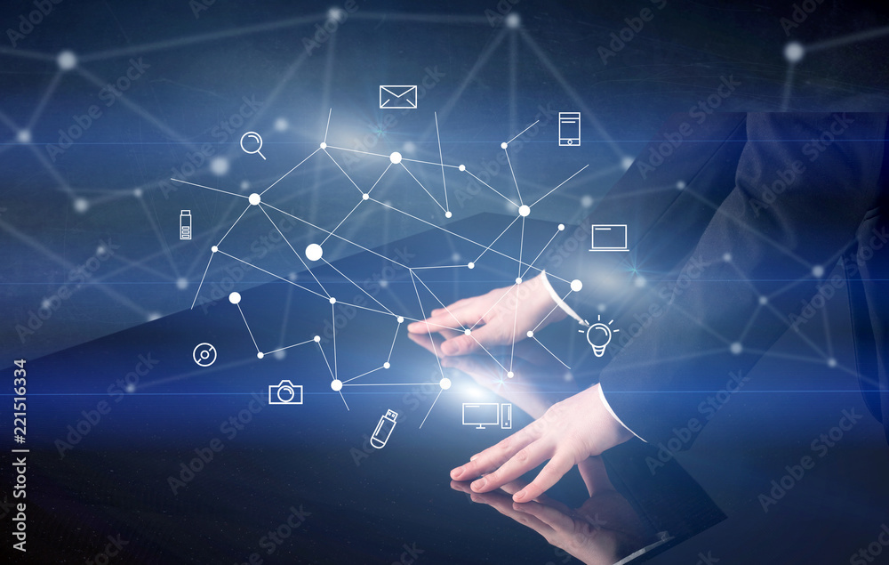 Poster male hands touching interactive table with blue mixed communication icons in the background