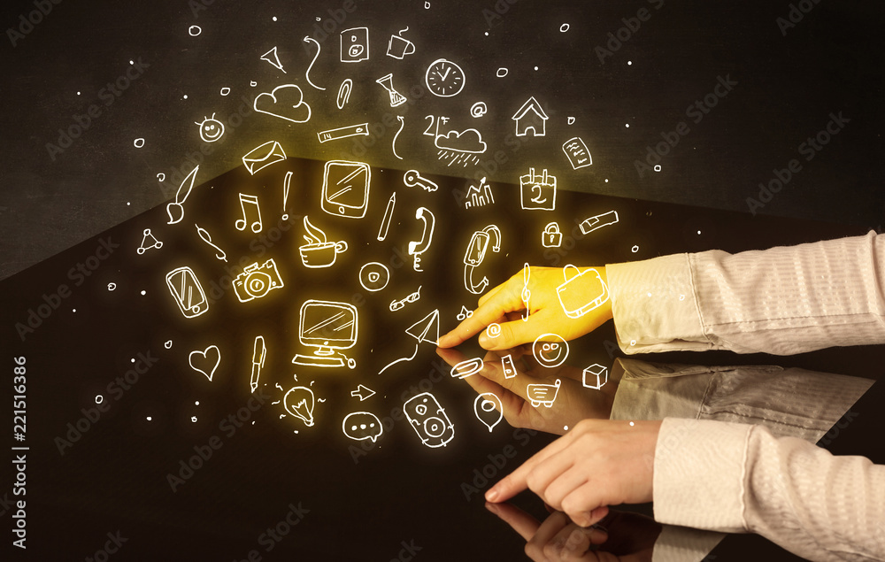 Poster male hands touching interactive table with yellow mixed media icons on it