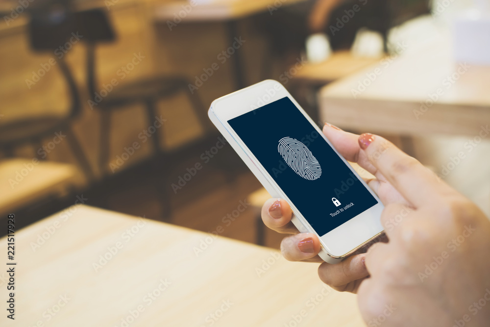 Poster Hand women holding smartphone and scan fingerprint biometric identity for unlock her mobile phone