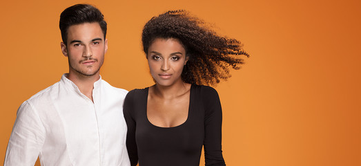 Happy couple posing together.