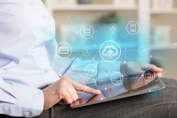 Business woman using tablet with network security and online storage system concept

