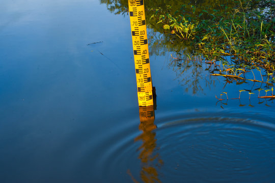 Reflector Of Water Level Meter Located In The Still Water.