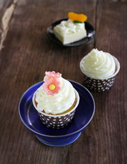 Vintage cupcake on wood table, selective focus