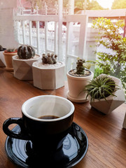 cup of hot coffee with smoke on table in the morning. copyspace for your text