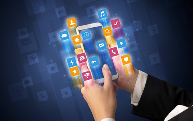 Female hand using smartphone with colorful angular fast switching application icons around