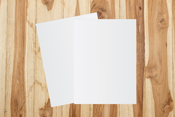 White template paper on wooden background