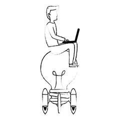 young man working with laptop in bulb launcher