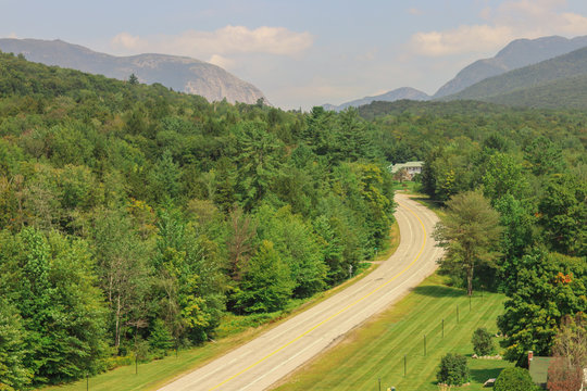 A summer scenic view of the white mountains and national forest in New Hampshire, taken as a drone picture from above of the beautiful scenery and nature. This background is beautiful.
