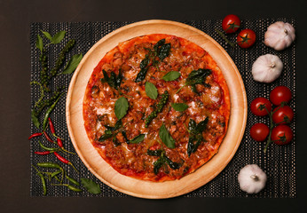 Pizza with ingredient in top view photo