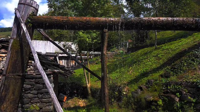 Working watermill wheel with falling water, Etara, Bulgaria