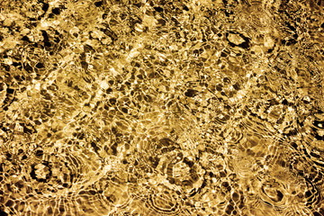 Abstract medley  background with a combination of golden and black colors_