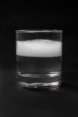 Summer cocktail on isolated black background